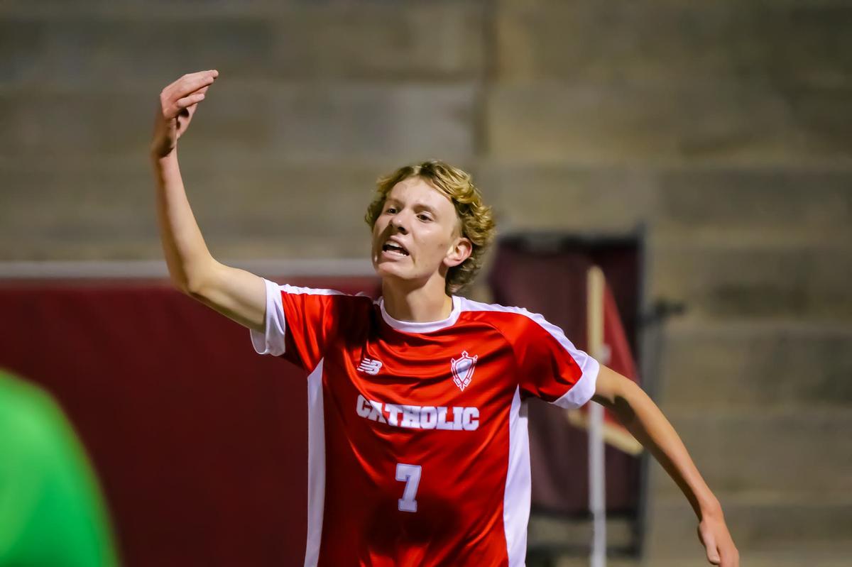 Charlotte Catholic forward William Bumgarner celebrates the sweet sound of scoring against Garinger during the game at Charlotte Catholic High School in Pineville, NC on October 14th, 2024