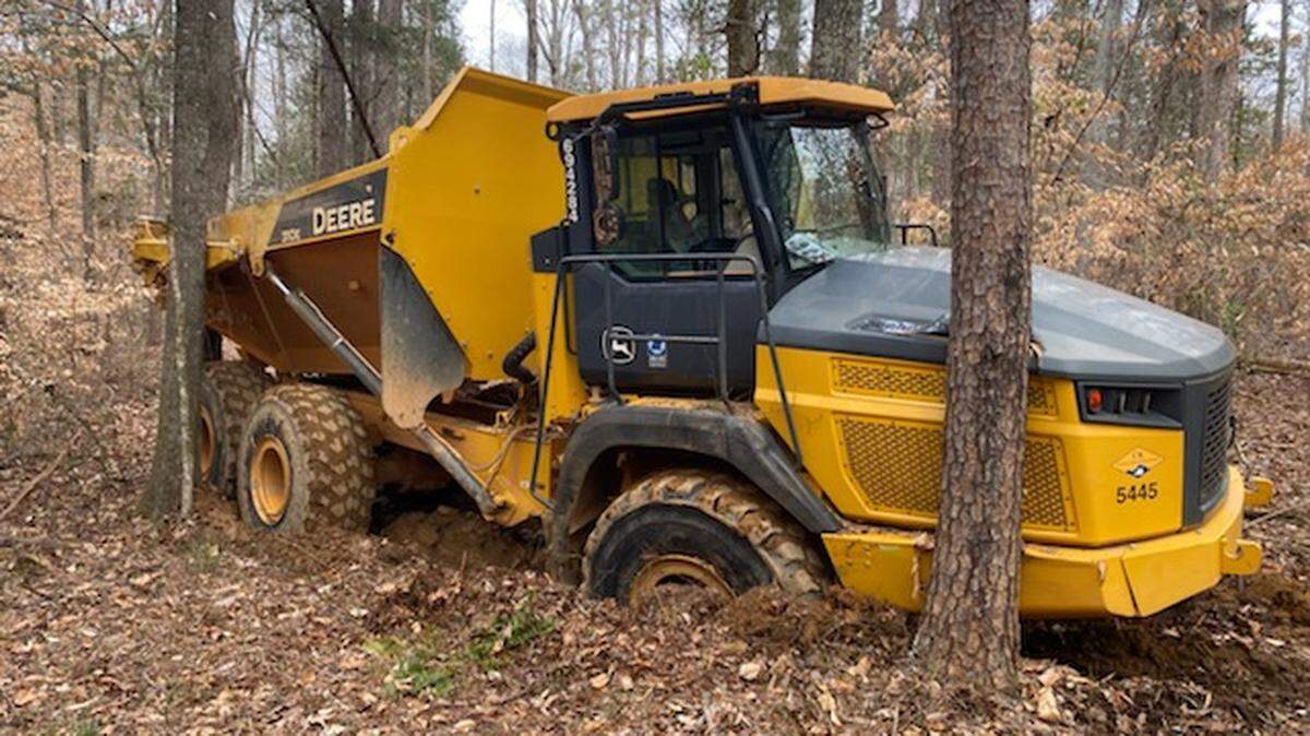 Pineville police officers were led on a slow-speed chase by the driver of this stolen construction vehicle on Monday.