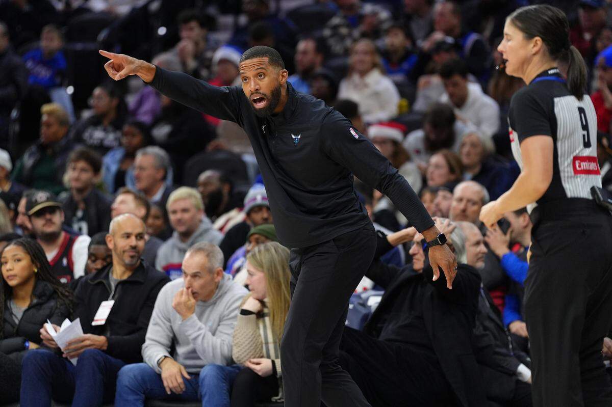 Dec 20, 2024; Philadelphia, Pennsylvania, USA; Charlotte Hornets head coach Charles Lee reacts against the Philadelphia 76ers in the fourth quarter at Wells Fargo Center. Mandatory Credit: Kyle Ross-Imagn Images