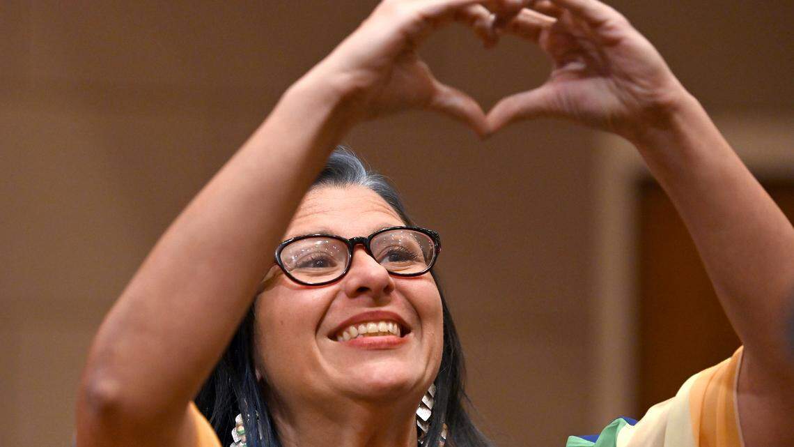 Charlotte Mecklenburg school board member Melissa Easley gestures to an audience member during the board’s meeting at the Charlotte-Mecklenburg Government Center on Tuesday, August 22, 2023. CMS is one of the first to pass policies to comply with Senate Bill 49.