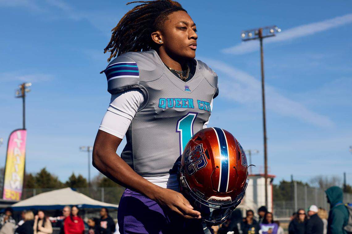 Chambers QB Zyon Hailey (1) runs onto the field prior to the start of the Queen City Senior Bowl hosted at Olympic High School.