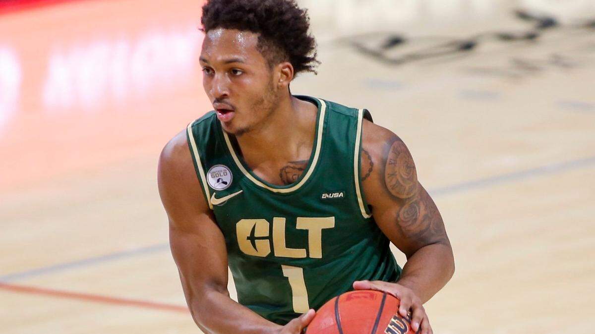 Charlotte guard Jahmir Young brings the ball upcourt against Davidson in the second half of a college basketball game in Davidson, N.C., Tuesday, Dec. 15, 2020.