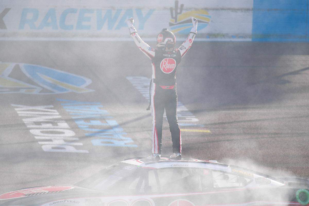 Christopher Bell celebrates his NASCAR Cup Series victory of the Shriners Childrens 500 on March 10, 2024, in Avondale, Ariz., at Phoenix Raceway.