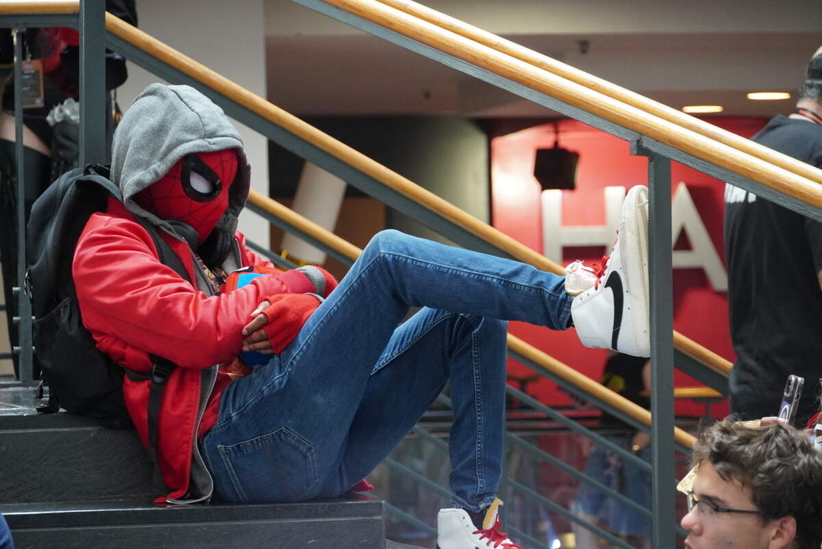 Cosplayers can truly get into character at Charlotte Big Anime, even with the Amazing Spider-Man making a debut while relaxing on the convention stairs.