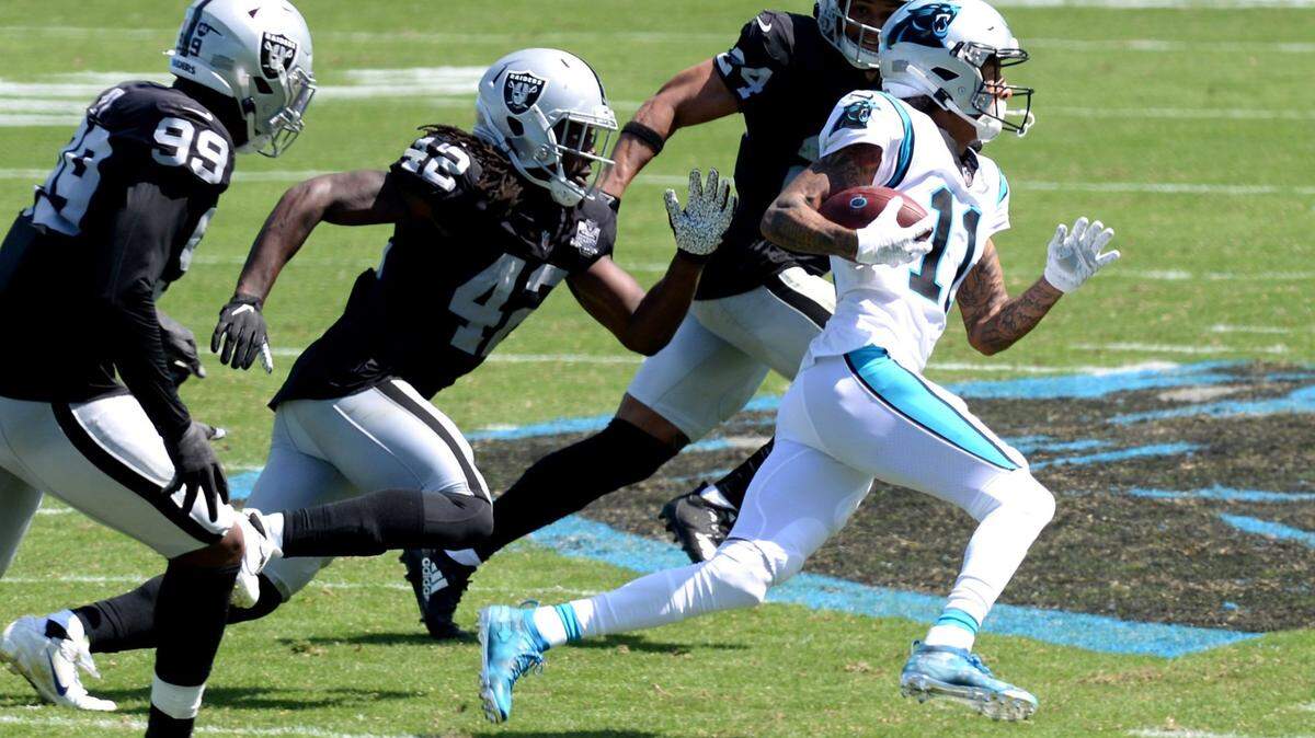 Carolina Panthers wide receiver Robby Anderson, right, breaks to the outside following a pass reception during second quarter action against the Las Vegas Raiders on Sunday, September 13, 2020 at Bank of America Stadium in Charlotte, NC.