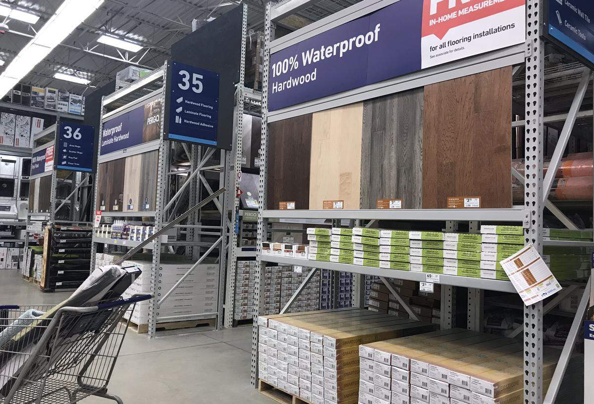 Samples of hardwood and laminate flooring are displayed prominently at the overhauled Lowe’s store on Ballantyne Commons Parkway.