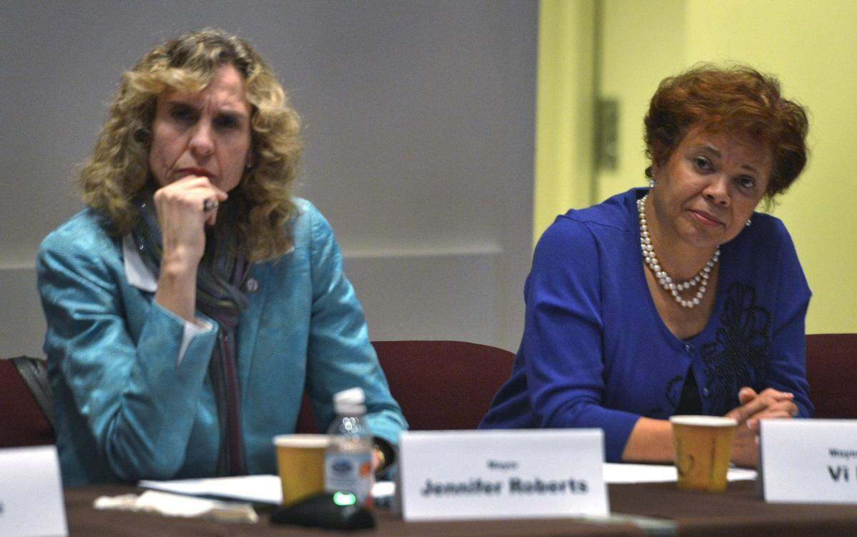 Charlotte Mayor Jennifer Roberts and Mayor Pro Tem Vi Lyles listen as council member LaWanda Mayfield speaks before the Charlotte City Council voted to rescind the LGBT ordinance that prompted House Bill 2. The council was meeting at a breakfast meeting called to discuss its legislative agenda. Mayor Roberts called it the first concrete opportunity to repeal HB2. The law, which limits LGBT rights, has been cited as the reason for millions in lost economic development and boycotts by the NCAA and others.