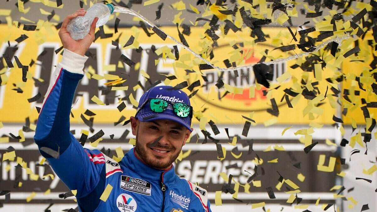 Kyle Larson celebrates after winning a NASCAR Cup Series auto race Sunday, March 7, 2021, in Las Vegas. (AP Photo/John Locher)