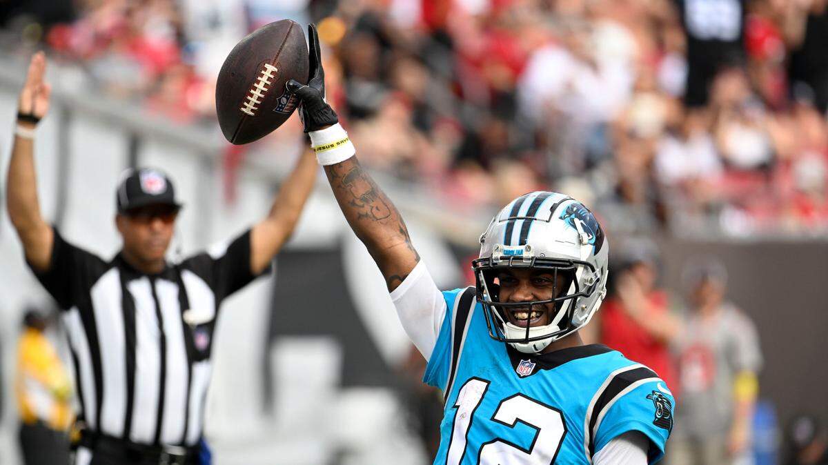 Carolina Panthers wide receiver Shi Smith celebrates after scoring during the second half of an NFL football game between the Carolina Panthers and the Tampa Bay Buccaneers on Sunday, Jan. 1, 2023, in Tampa, Fla. (AP Photo/Jason Behnken)