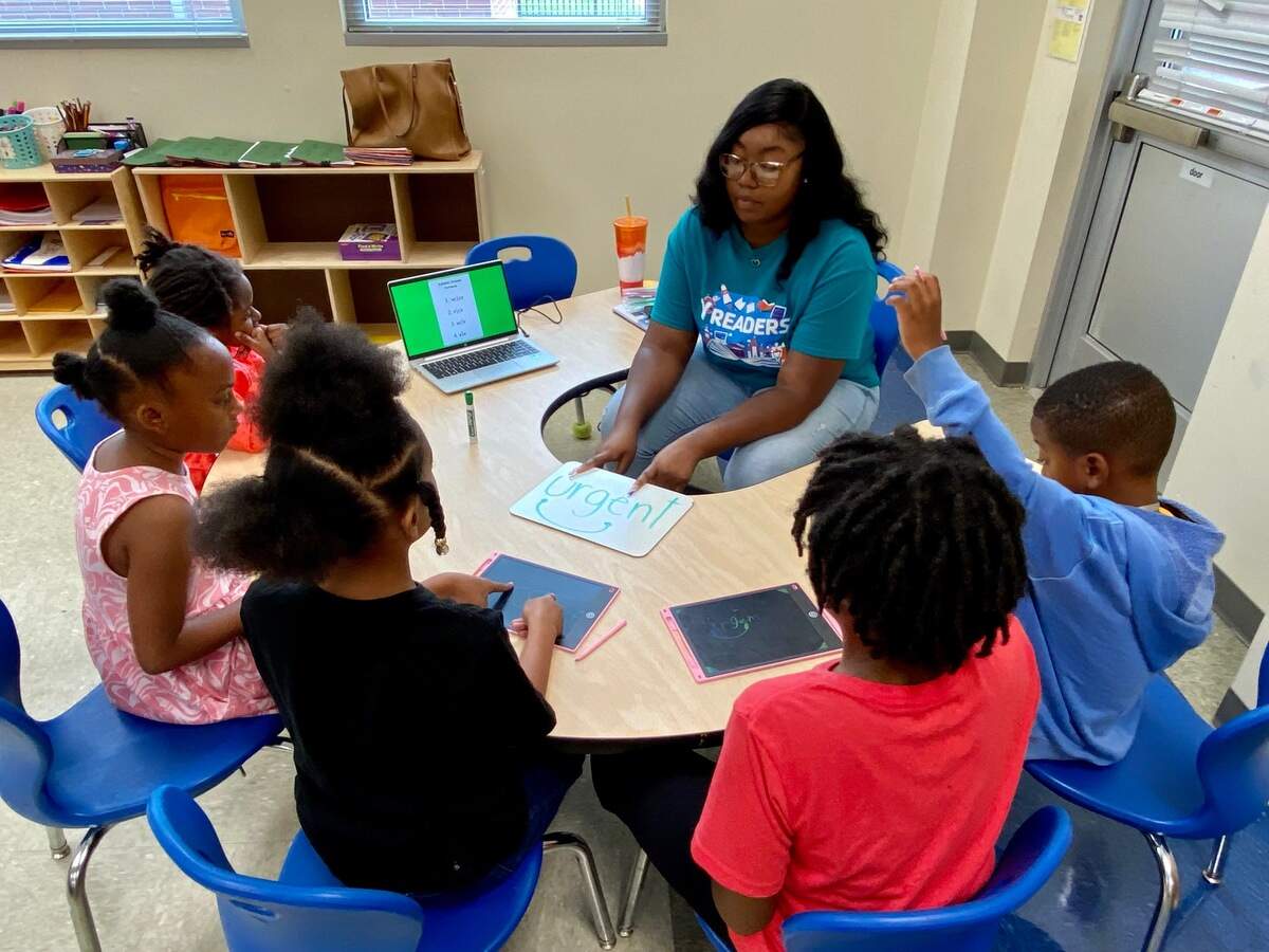 Staff from Y Readers help rising second- and third-graders at Renaissance West STEAM Academy build reading skills over the summer.
