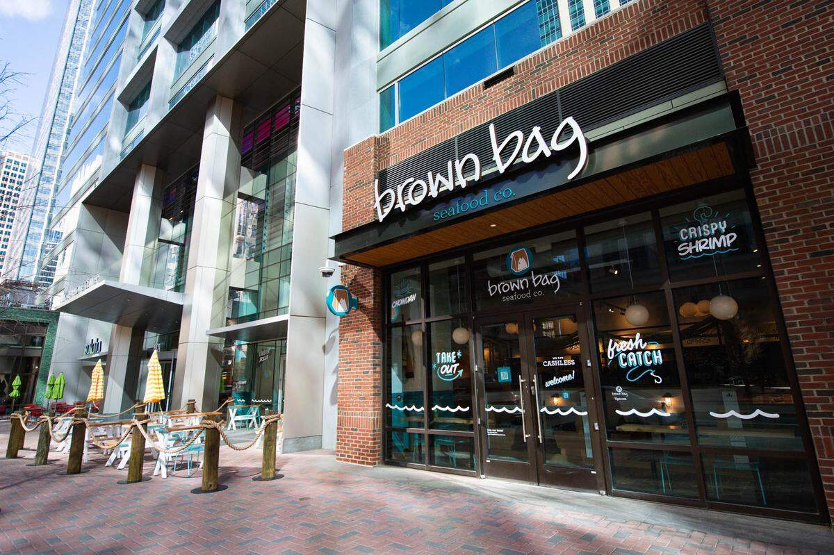 Brown Bag Seafood Co. at 601 S. Tryon St. in the Ally Center includes an outdoor patio space with picnic tables.