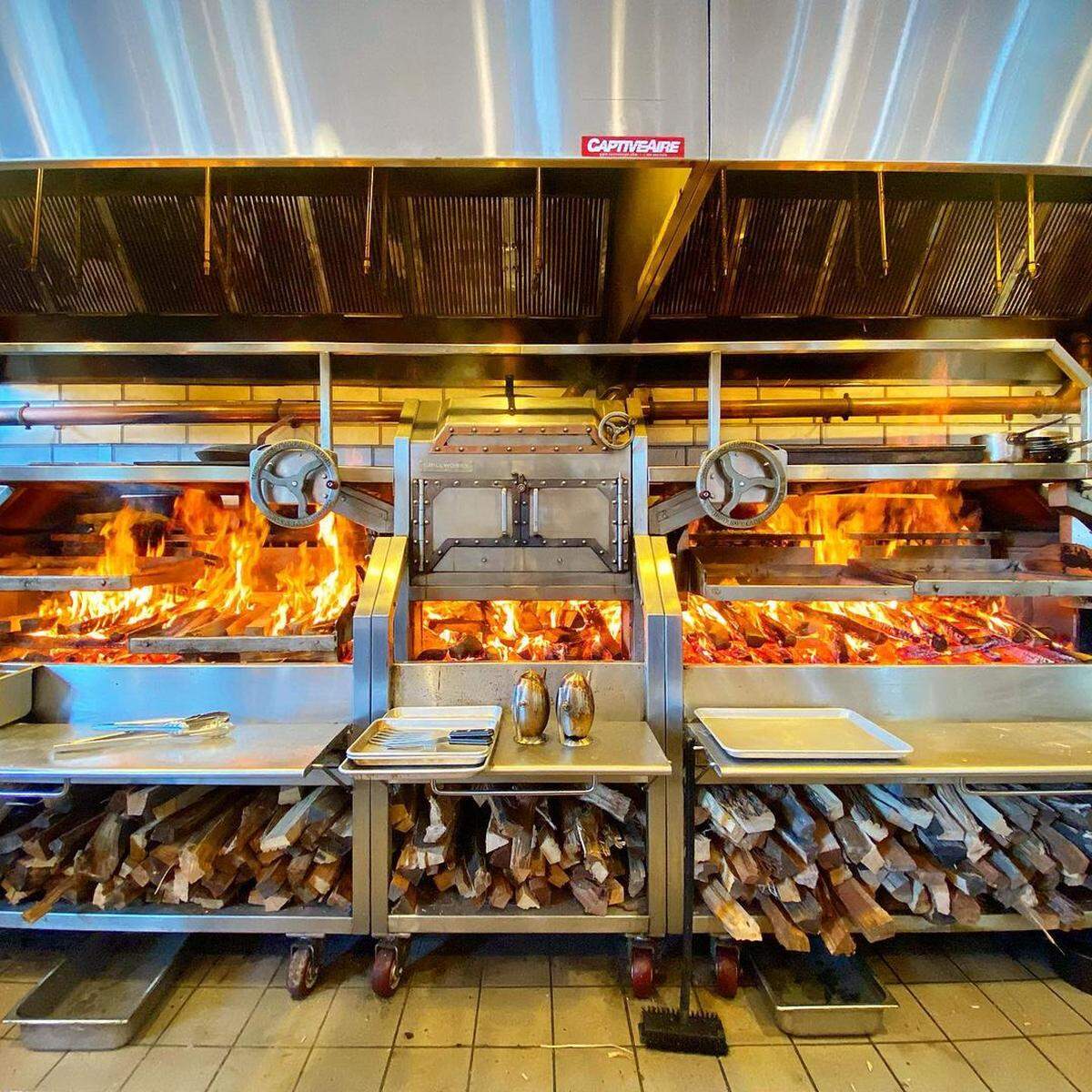 Supperland has a 14-foot fire grill at its restaurant in Plaza Midwood.