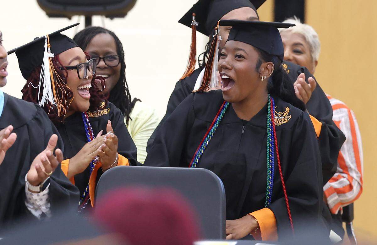 Rocky River High School student-athlete Nicole Johnson, right, reacts to being named The Jaire Alexander Foundation Scholarship’s winner on Tuesday, May 19, 2026.