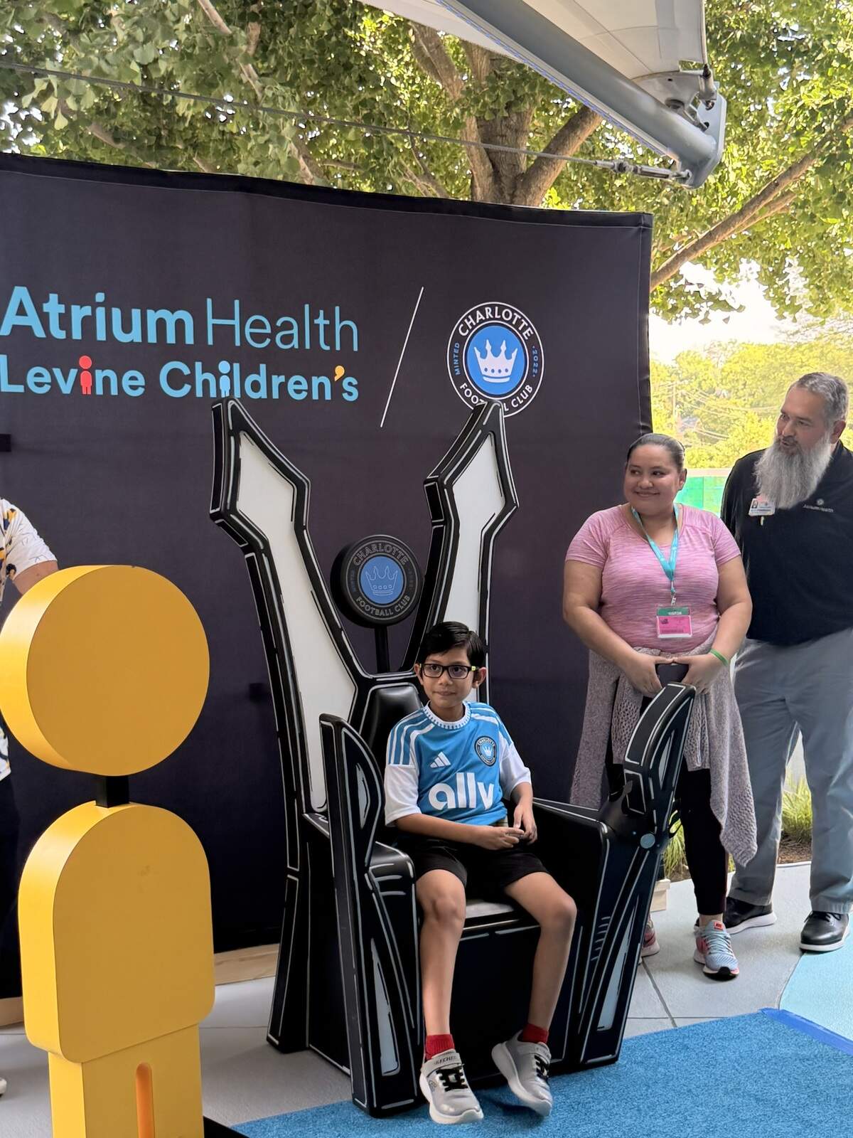 Derek Munizcalero, an 8-year-old patient and devoted soccer fan, served as the guest of honor during the event