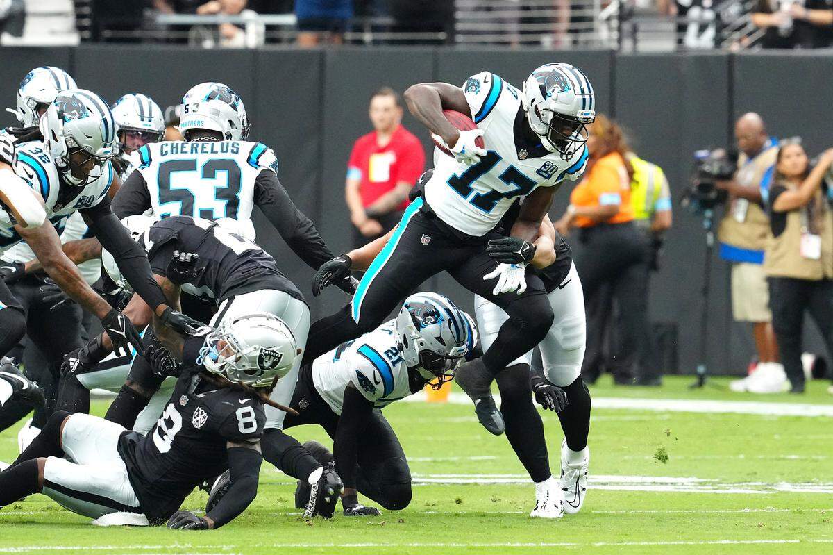 Sep 22, 2024; Paradise, Nevada, USA; Carolina Panthers wide receiver Xavier Legette (17) gains yardage against the Las Vegas Raiders during the first quarter at Allegiant Stadium. Mandatory Credit: Stephen R. Sylvanie-Imagn Images
