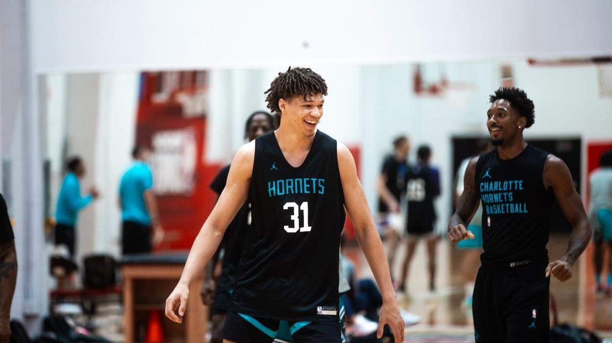 Charlotte Hornets rookie Tidjane Salaün is all smiles during an NBA summer league practice on July 11, 2024.