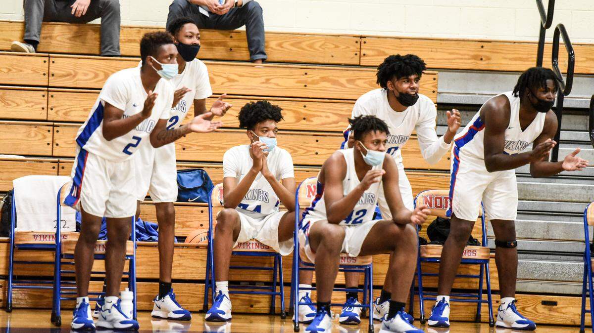 North Mecklenburg’s bench celebrates at North Mecklenburg High School in Huntersville, NC, on Tuesday, February 25, 2021.