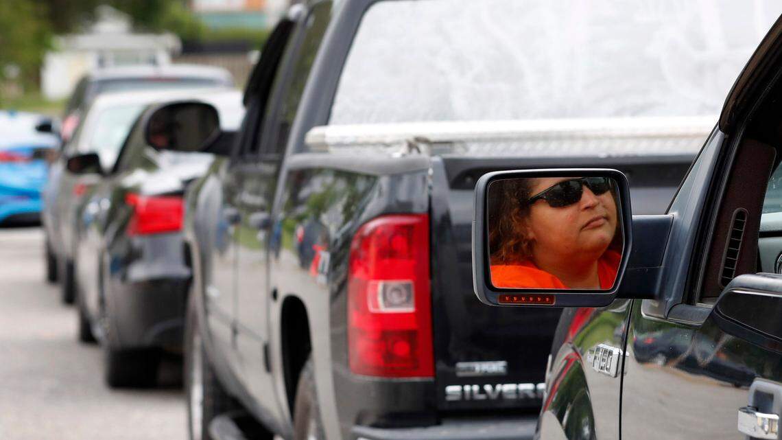 Glenda Wendt sits in her vehicle waiting in a long line to get gas at the Short Stop in Beulaville, N.C., Tuesday, May 11, 2021. Wendt said getting gas ëis not a must but I rather get it while there is some than (getting) none at all.î