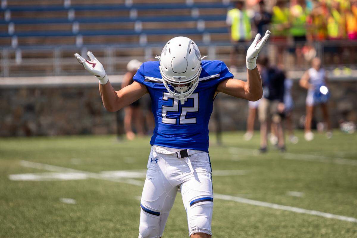 A Charlotte Christian player takes a bow after a play during Saturday’s win over Myers Park
