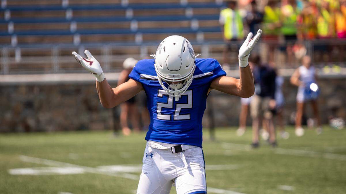 A Charlotte Christian player takes a bow after a play during Saturday’s win over Myers Park