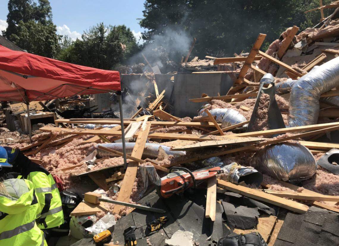 Mecklenburg EMS and Charlotte Fire Department during rescue operations at Ballantyne home