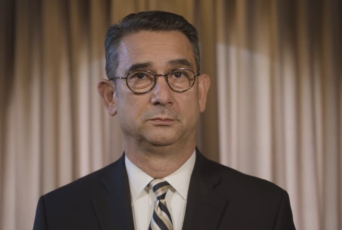 Wingate University President Rhett Brown, shown in this screen capture from video
