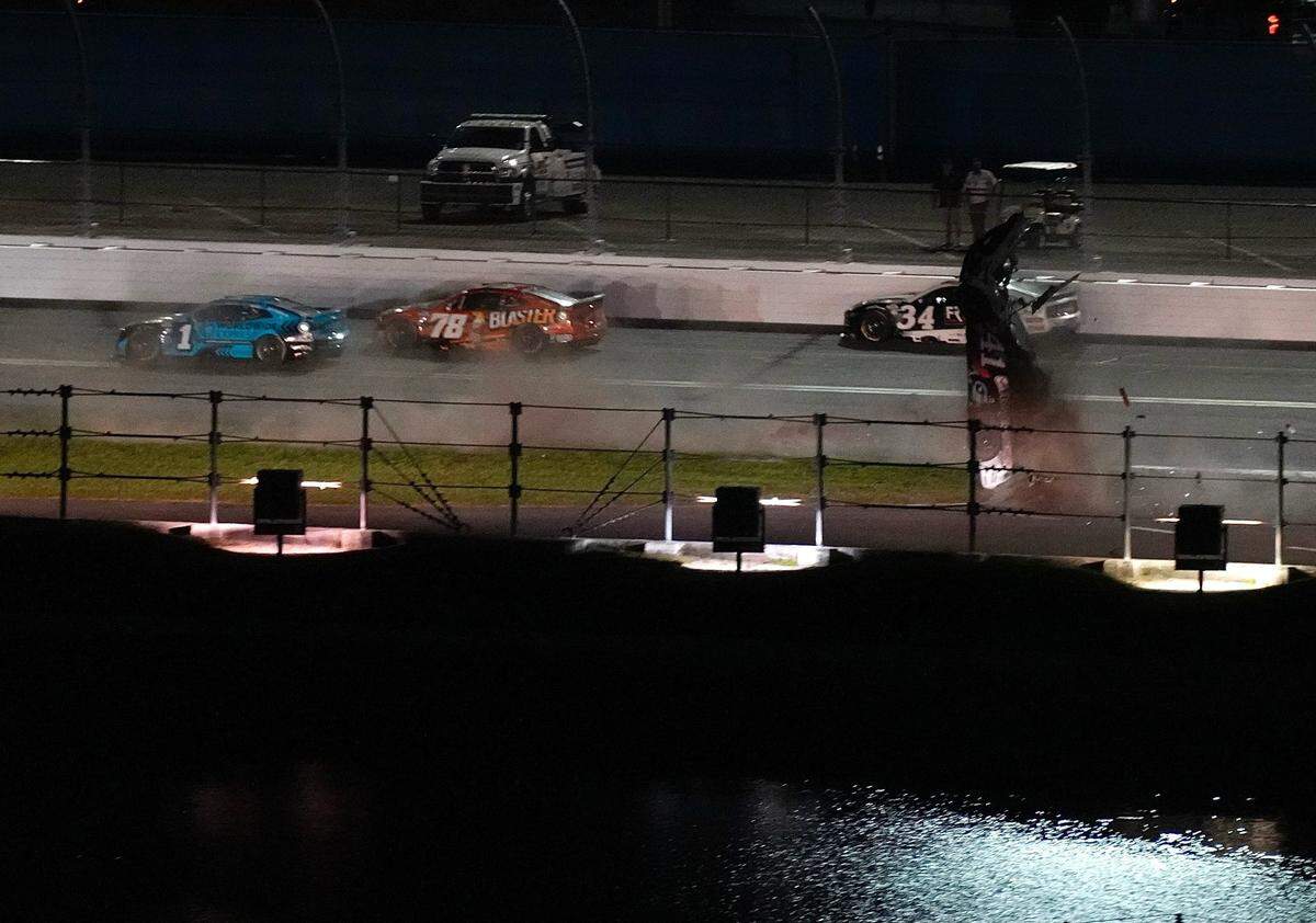 Ryan Preece crashes in the grass on the backstretch during the final laps of the Coke Zero Sugar 400 on Daytona.