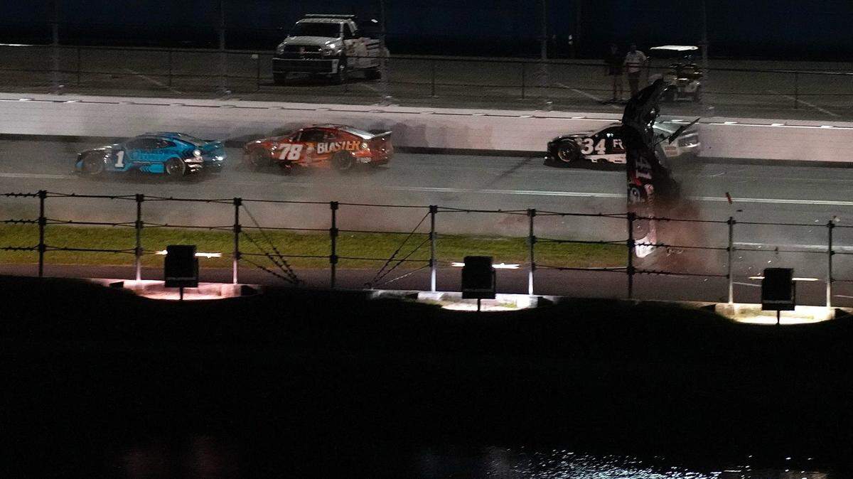 Ryan Preece crashes in the grass on the backstretch during the final laps of the Coke Zero Sugar 400 on Daytona.
