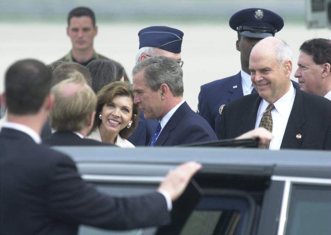 In April 2001, President George W. Bush greeted Teresa Earnhardt and other members of the Earnhardt family following his arrival  at Charlotte Douglas International Airport. Then-Congressman Robin Hayes is at right. 