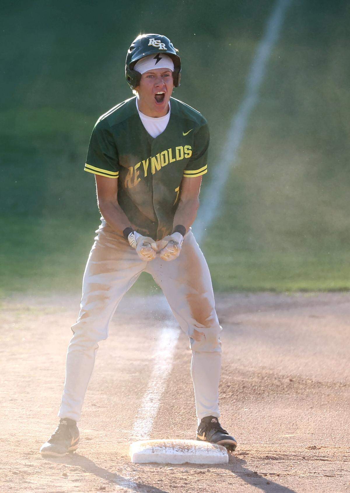 AC Reynolds’ Jace Frye celebrates a hit during third round NCHSAA action against the Charlotte Catholic Cougars at Jack Hughes Park in Pineville, NC on Tuesday, May 12, 2026. AC Reynolds defeated Charlotte Catholic 5-4.