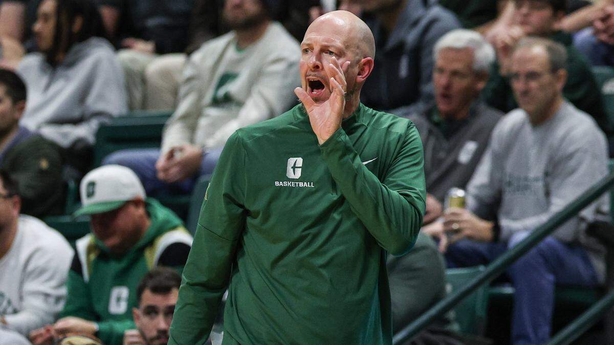 Charlotte head coach Aaron Fearne yells to players from the sideline during the gainst against Davidson at Dale F. Halton Arena in Charlotte, NC on Tuesday, November 11, 2025.