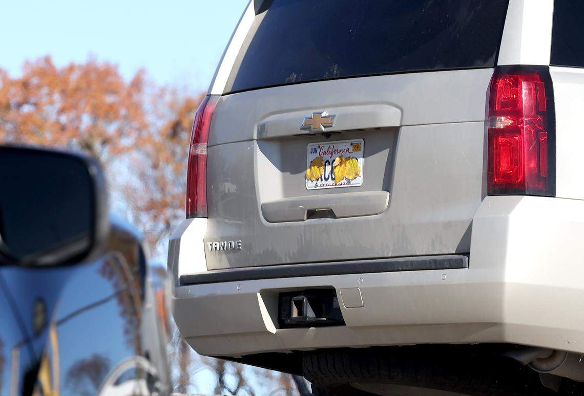 Leaves obstruct the license plate of a U.S. Customs and Border Patrol vehicle as agents leave the parking lot of the Compare Foods on North Tryon St. in Charlotte, NC on Monday, November 17, 2025.