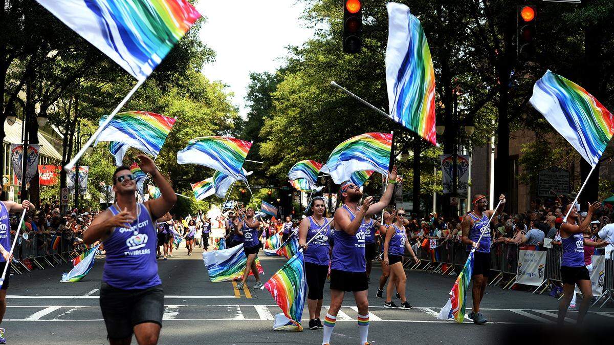 Members of Queen City Twirlers perform during the 2017 Charlotte Pride Parade Sunday in uptown Charlotte.

              