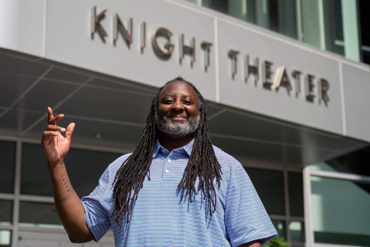 Emmy Award-winning poet, Boris “Bluz” Rogers, poses outside the Knight Theater. Rogers is the new Director of Creative Engagement for Blumenthal Performing Arts.