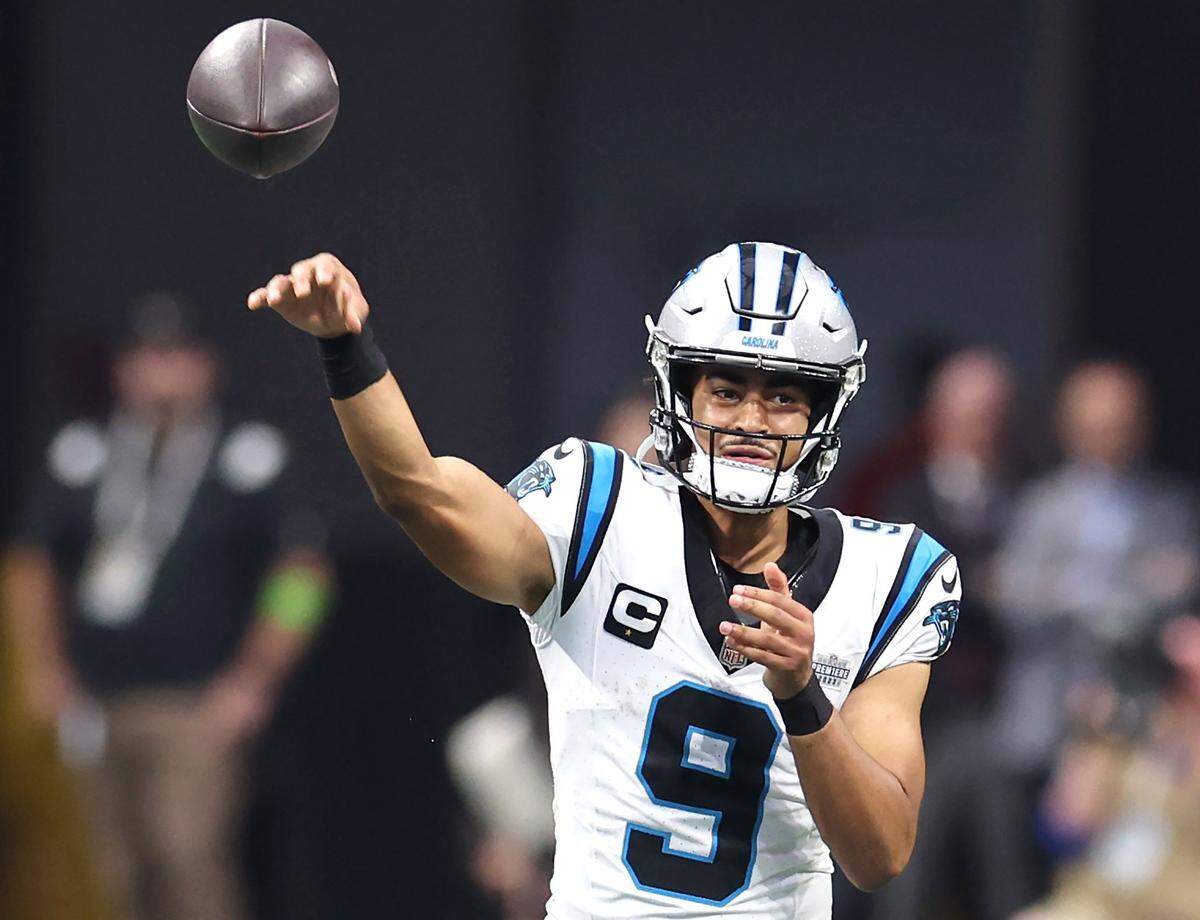 Carolina Panthers quarterback Bryce Young passes to a receiver during fourth-quarter action against the Atlanta Falcons at Mercedes-Benz Stadium in Atlanta, GA on Sunday, September 10, 2023. The Falcons defeated the Panthers 24-10.