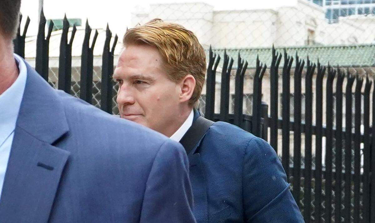 Greg Lindberg, shown entering the federal courthouse in Charlotte, NC, on Feb. 24, 2020, will get a new trial in 2023.