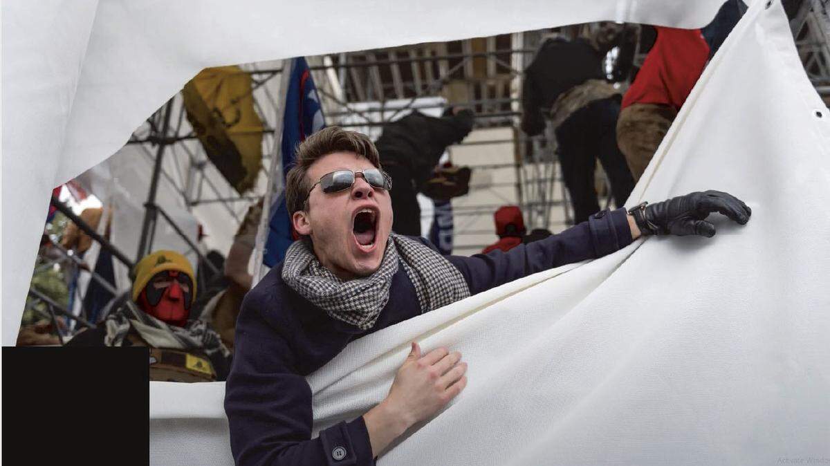 Matthew Wood of Reidsville, shown at the riot at the U.S. Capitol on Jan. 6, 2021, could spend up to almost 5 years in prison for his crimes. His attorney says Wood deserves home detention. A judge will have the final say. Photo courtesy of the U.S. Department of Justice.