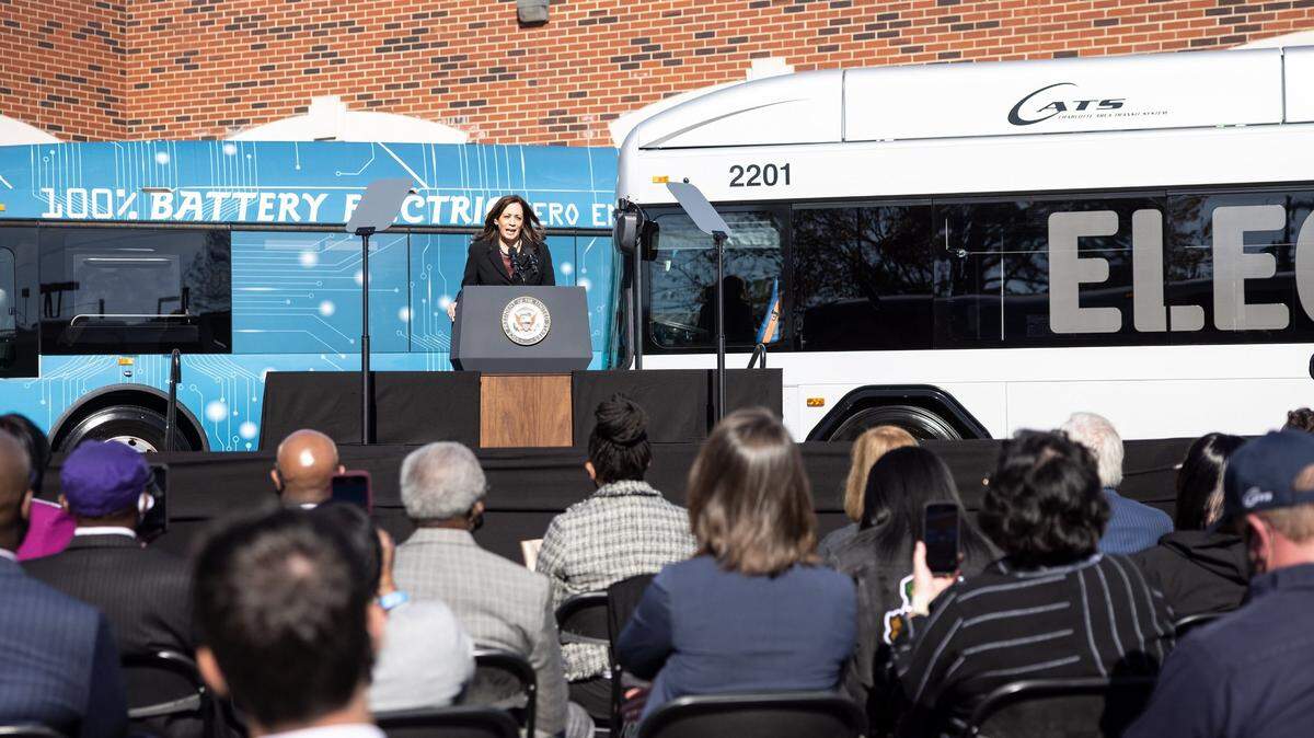 Vice President Kamala Harris speaking at the Charlotte Area Transit System garage in Charlotte, N.C., on Dec. 2, 2021. With the new infrastructure law, she said, “America is moving again.”