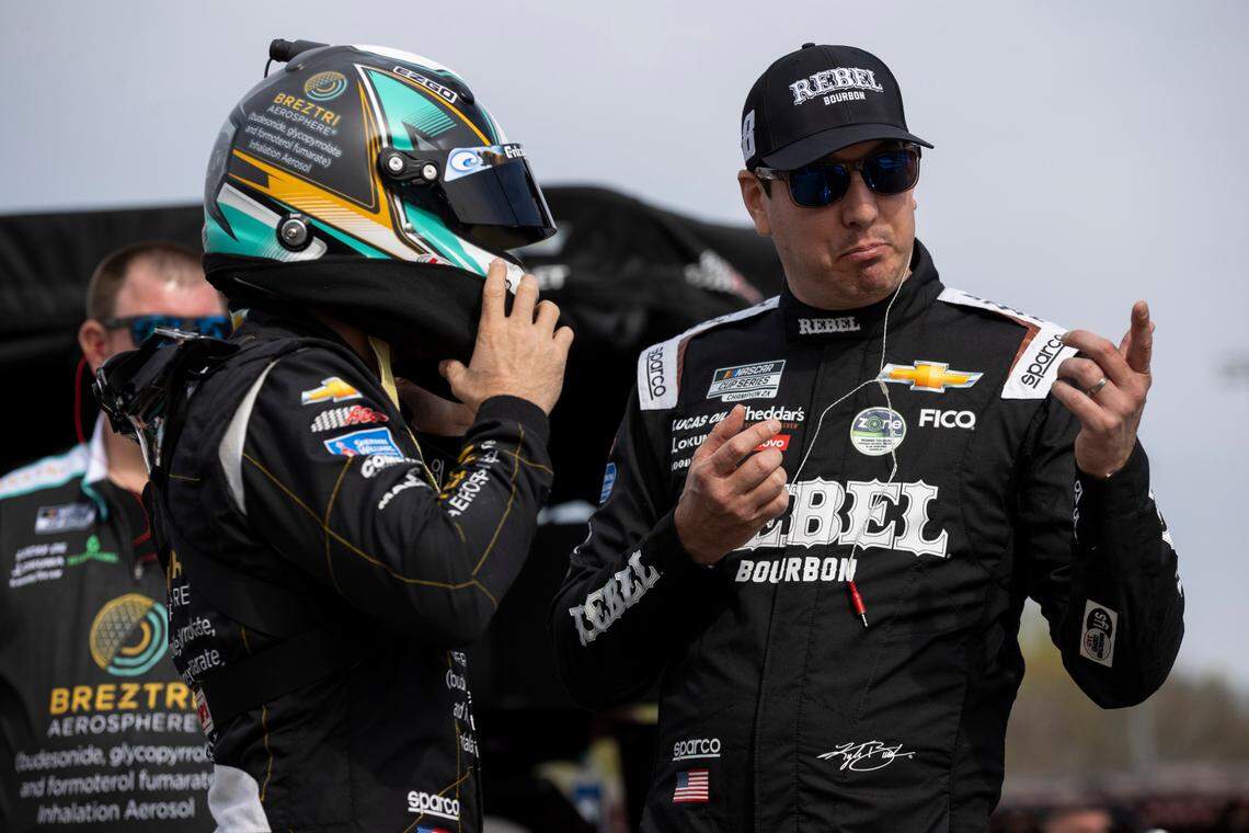 Mar 30, 2024; Richmond, Virginia, USA; NASCAR Cup Series driver Kyle Busch (8) talks to NASCAR Cup Series driver Austin Dillon (3) during practice for the Toyota Owners 400 at Richmond Raceway.
