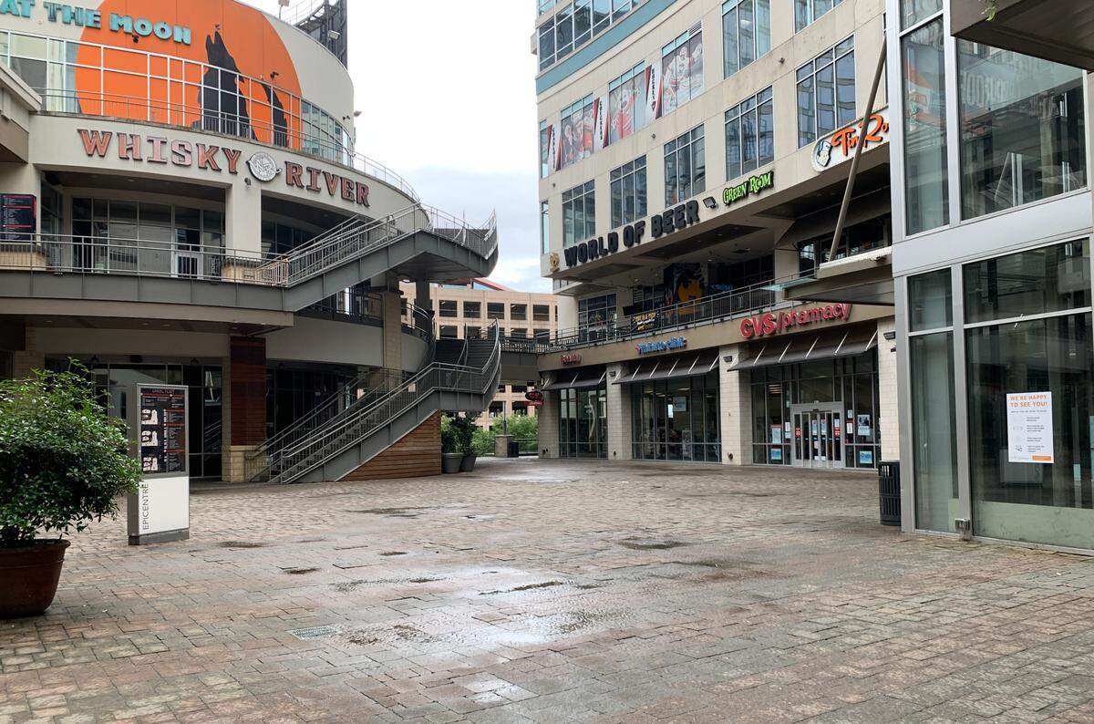 The Epicentre — a once-popular shopping center facing potential foreclosure — stands largely vacated of businesses and patrons on July 2, 2021, in Charlotte.