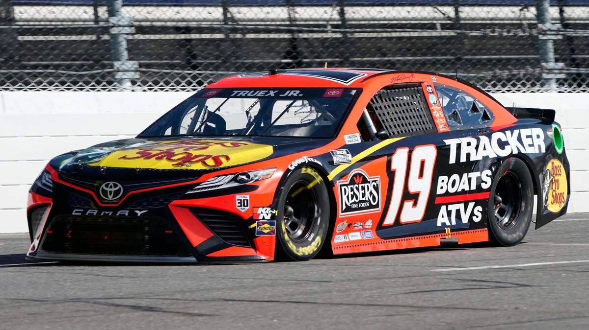 Martin Truex Jr., approaches the third turn during the NASCAR Cup Series auto race at Martinsville Speedway in Martinsville, Va., Sunday, April 11, 2021. (AP Photo/Steve Helber)