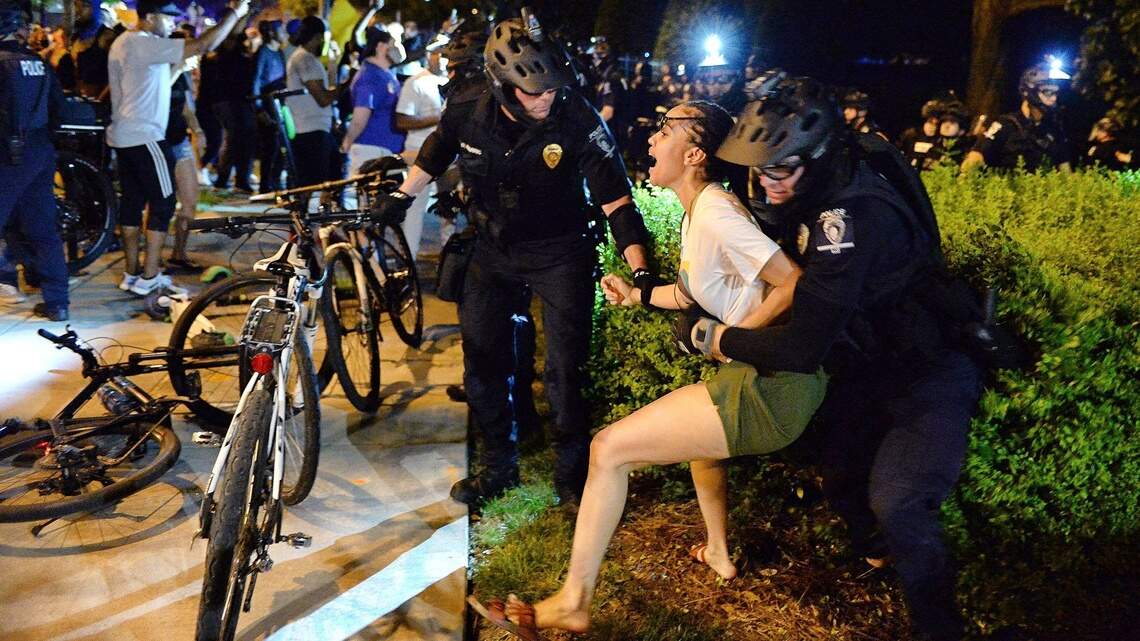 Charlotte protests spike, CMPD arrests demonstrators uptown in second night of unrest