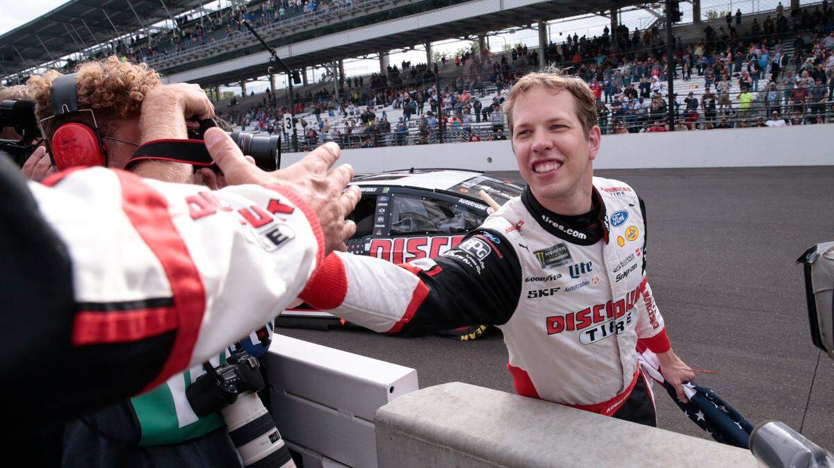 Brad Keselowski celebrates after winning NASCAR’s Brickyard 400 on Monday at Indianapolis Motor Speedway.