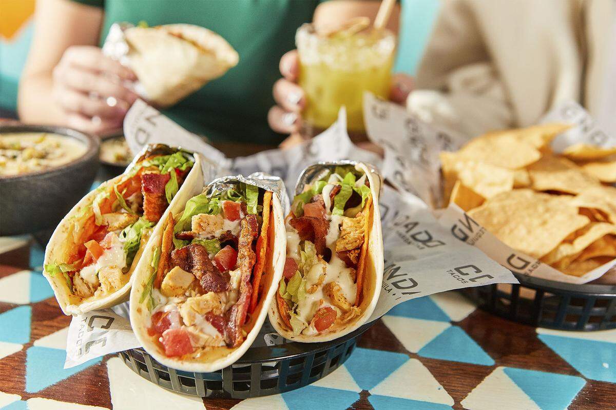 Condado Tacos’ signature Chicken Bacon Ranch tacos.