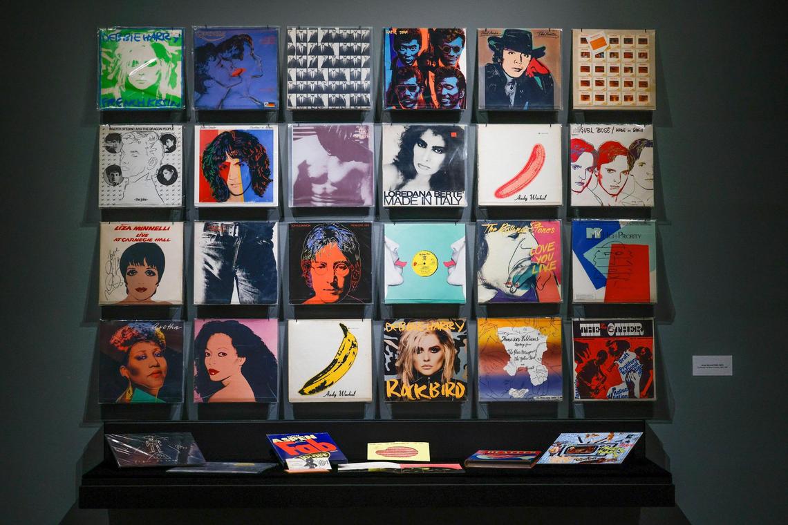 Record album covers designed by Andy Warhol at the Bechtler Museum for the “Pop to Now: Warhol and His Legacy” show. Liza Minnelli autographed her cover, far left, second from bottom row.