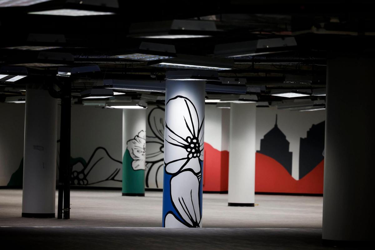 A vacant office floor in One Independence Center in uptown Charlotte is decked out in some artwork. The 20-story office tower, which sits at the Square at Trade and Tryon, has seen $25 million worth of upgrades and renovations over the last year.