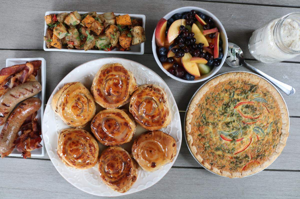 The Brunch Kit comes with pre-portioned pancake mix (eggs and milk not included), sausage, bacon, fruit, roots hash, quiche and cinnamon rolls for $100.