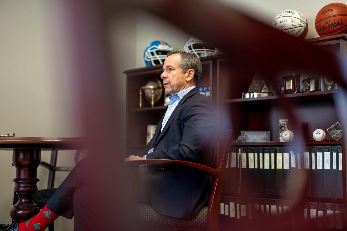 Kyle Kallander, the commissioner of the Big South Conference, talks with a reporter about different changes he would like to see after he leaves the position at the Big South Headquarters in Charlotte, NC on Friday, December 2, 2022.
