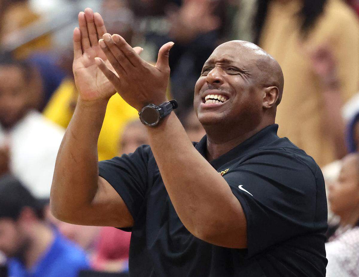 West Charlotte head basketball coach Jacoby Davis reacts to a call during action against North Meck on Friday, Feb. 13, 2026 at North Mecklenburg High School. 