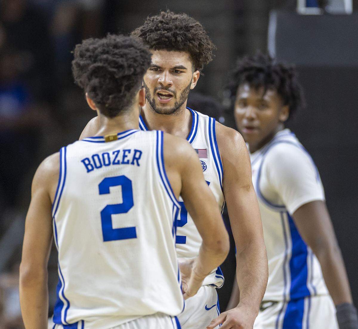 Duke forward Cameron Boozer (12) reacts with his brother Cayden Boozer (2) after a basket in the second half against TCU on Saturday, March 21, 2026, during the second round of the NCAA Tournament at Bon Secours Arena in Greenville, S.C.